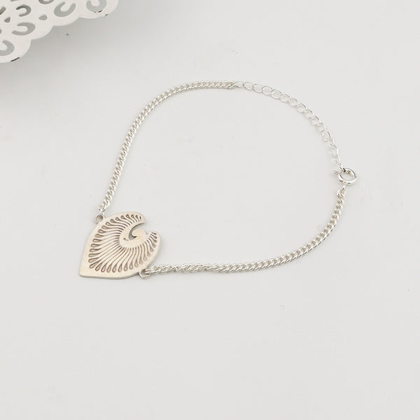 Angled side view of Silver Peacock Feather Bracelet