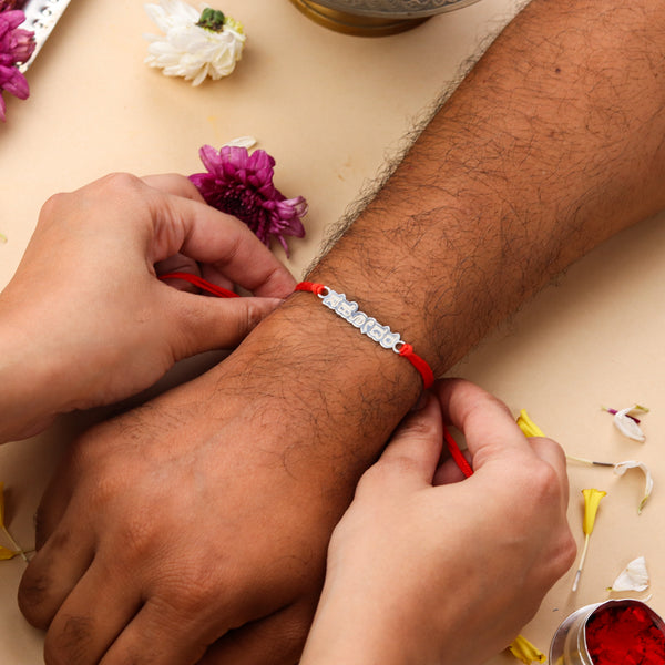 Silver Laser Cut 'Sōdaruḍu' (Brother) Rakhi in Telugu