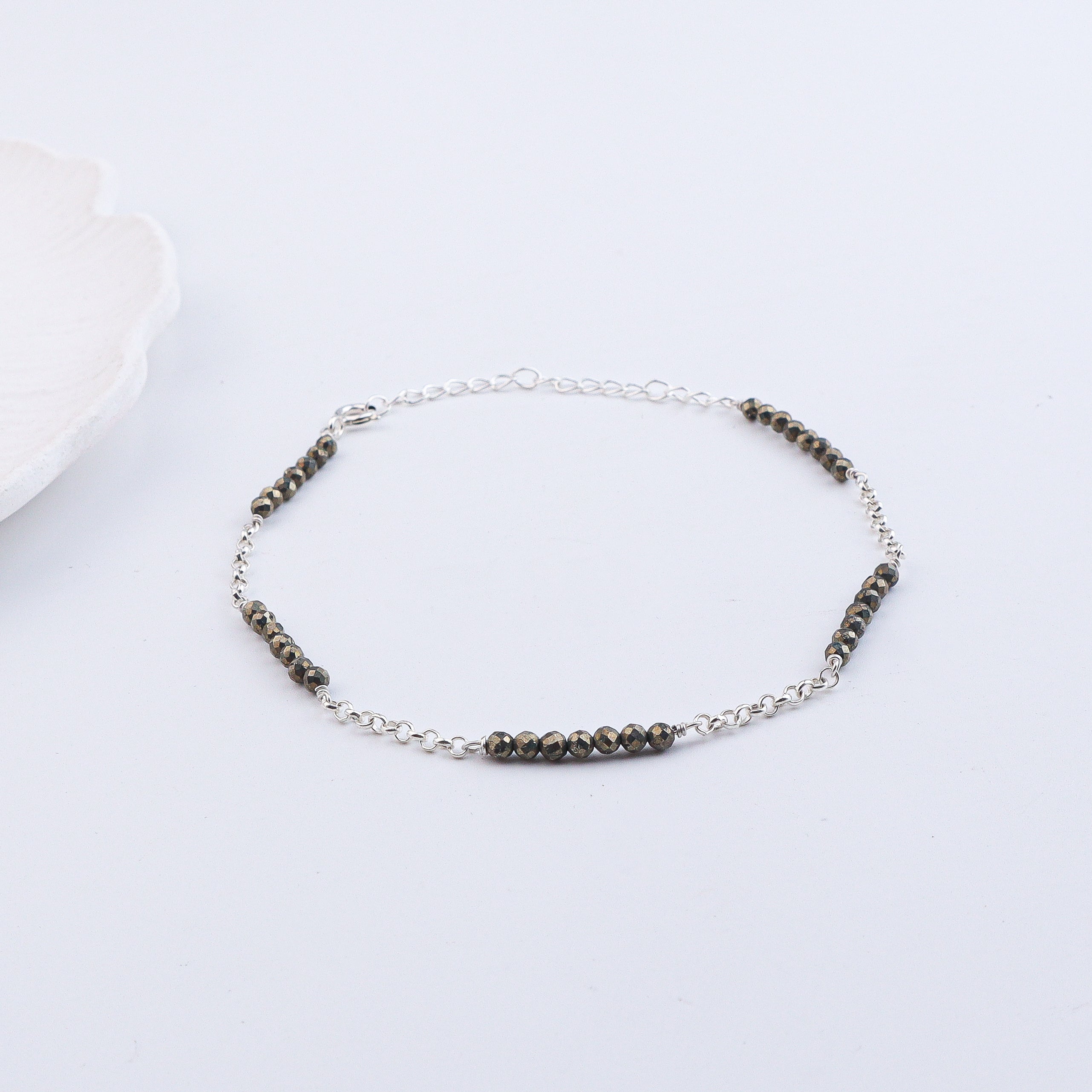 Silver anklet with black beads and chain