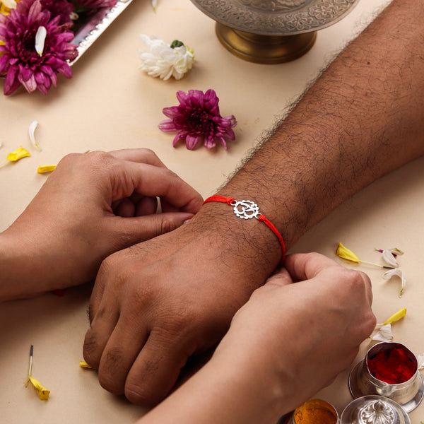 Silver Laser Cut Om Rakhi (mini)