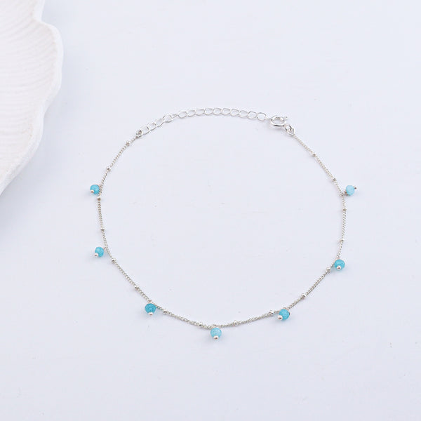 Silver anklet with blue gemstone beads