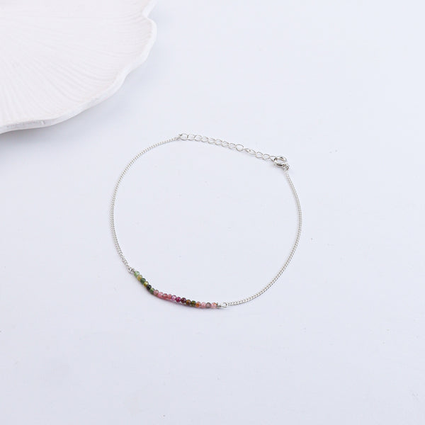 Silver anklet with rainbow-colored beads