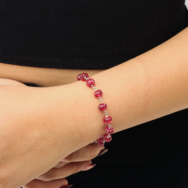 Close-up of Silver Ruby Ganthan Bracelet with ruby stone detail