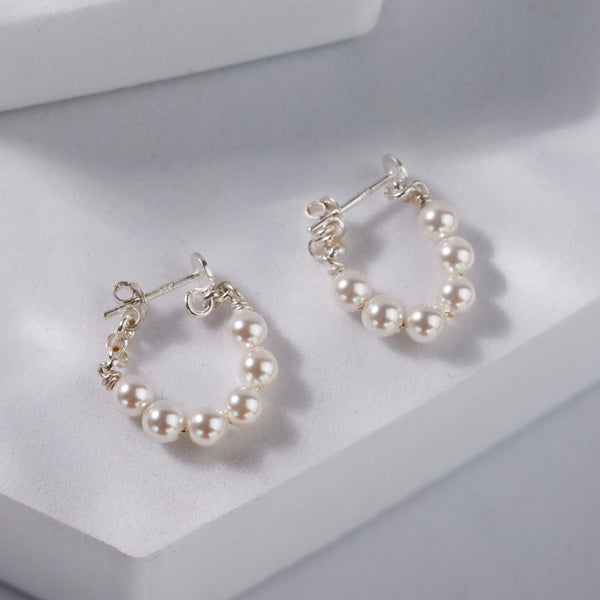 Pearl halo earrings refined design