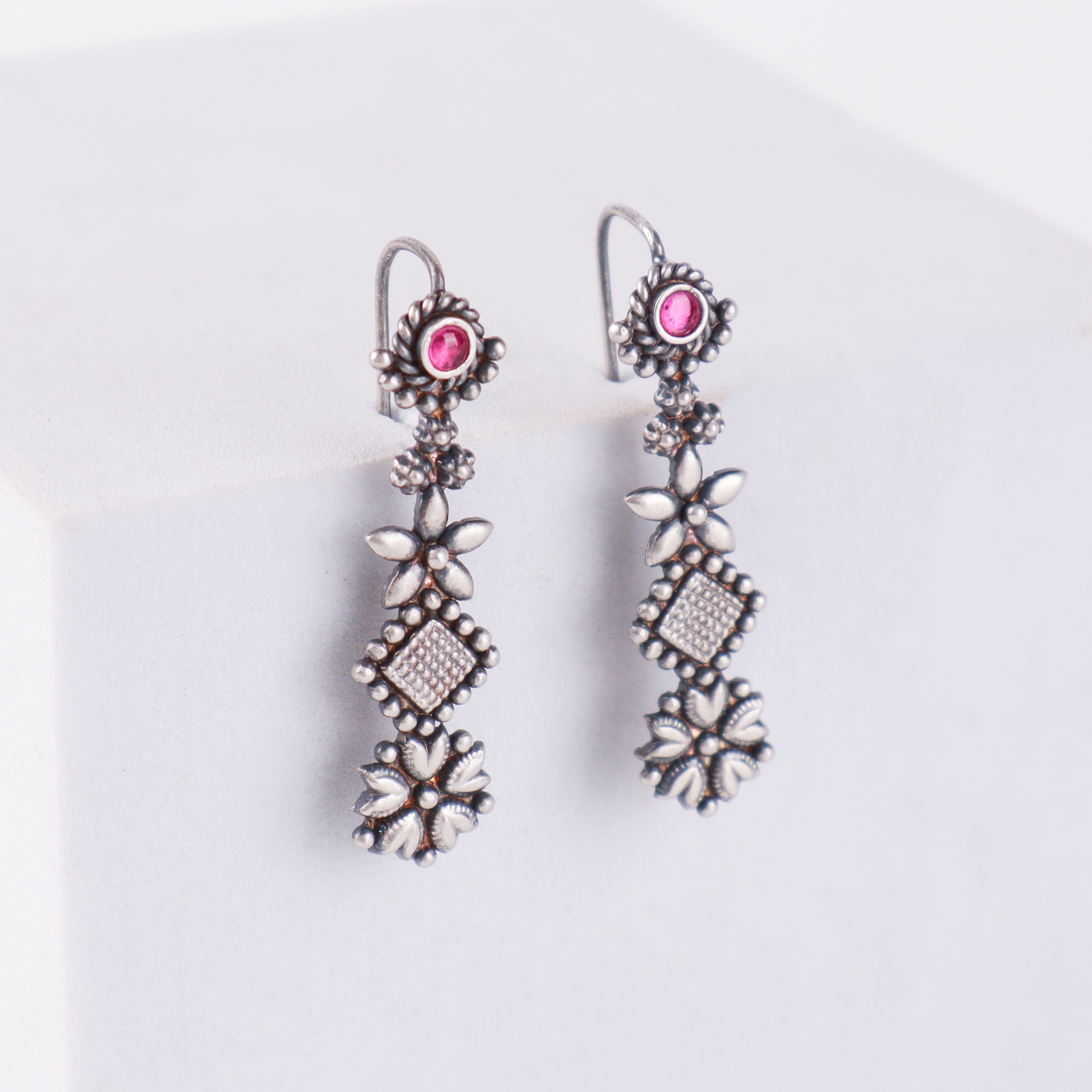 Multicharm dangling earring