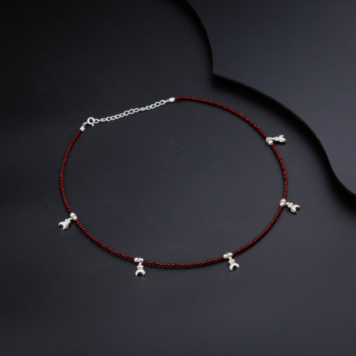 Silver Chandrakor Multi Charm Necklace with Garnet