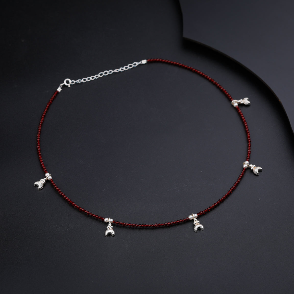 Silver Chandrakor Multi Charm Necklace with Garnet