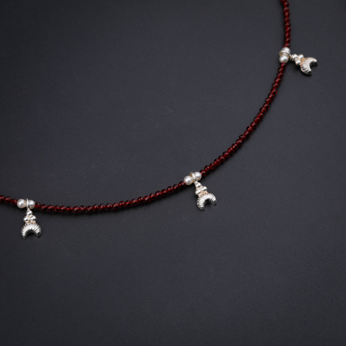 Silver Chandrakor Multi Charm Necklace with Garnet