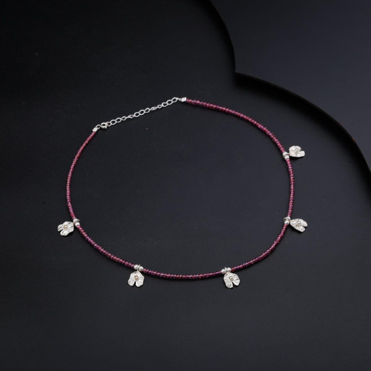 Silver Saroj Parn Multi Charm Necklace with Rhodolite