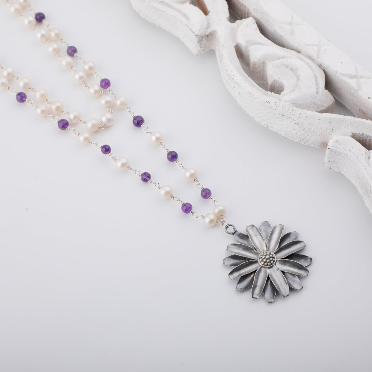 Soorajmukhi Flower Silver Pendant Necklace with Cream Pearl and Amethyst