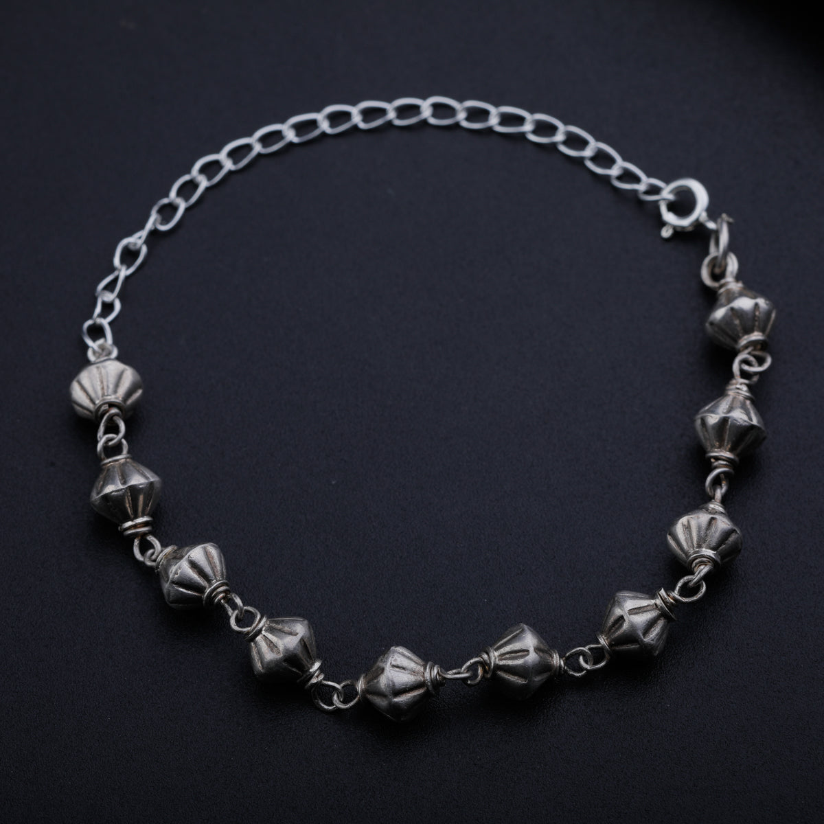 Silver Dholki Beads Ganthan Bracelet