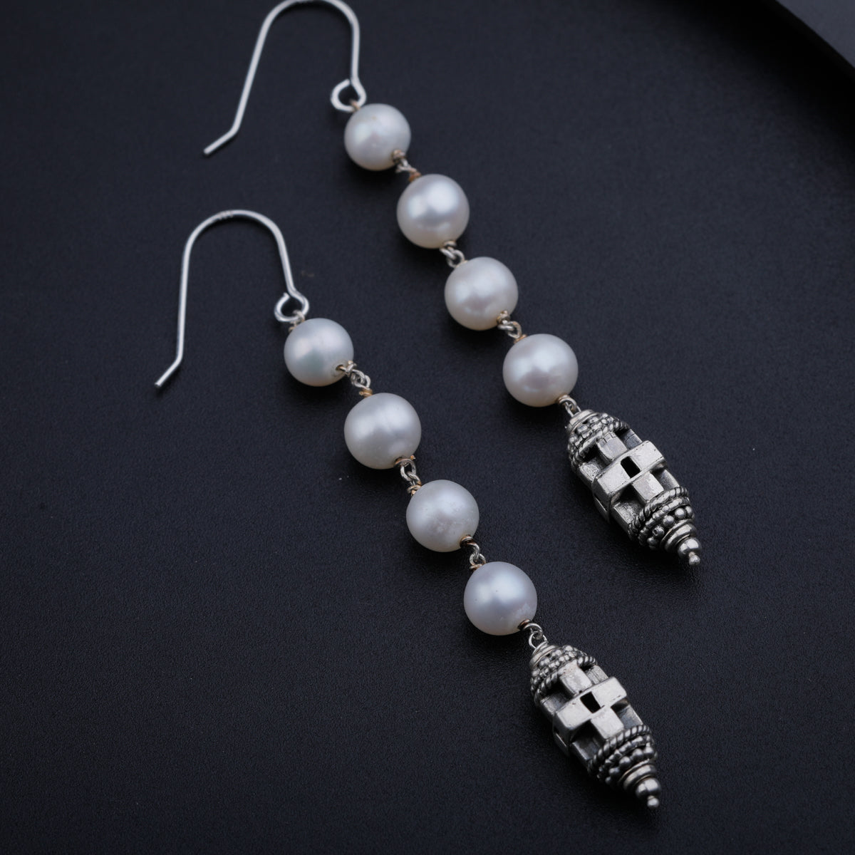 Silver Pendant Earring with Carved Bead