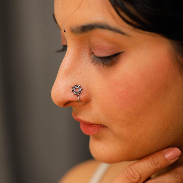 Silver clip on nose pin detailing