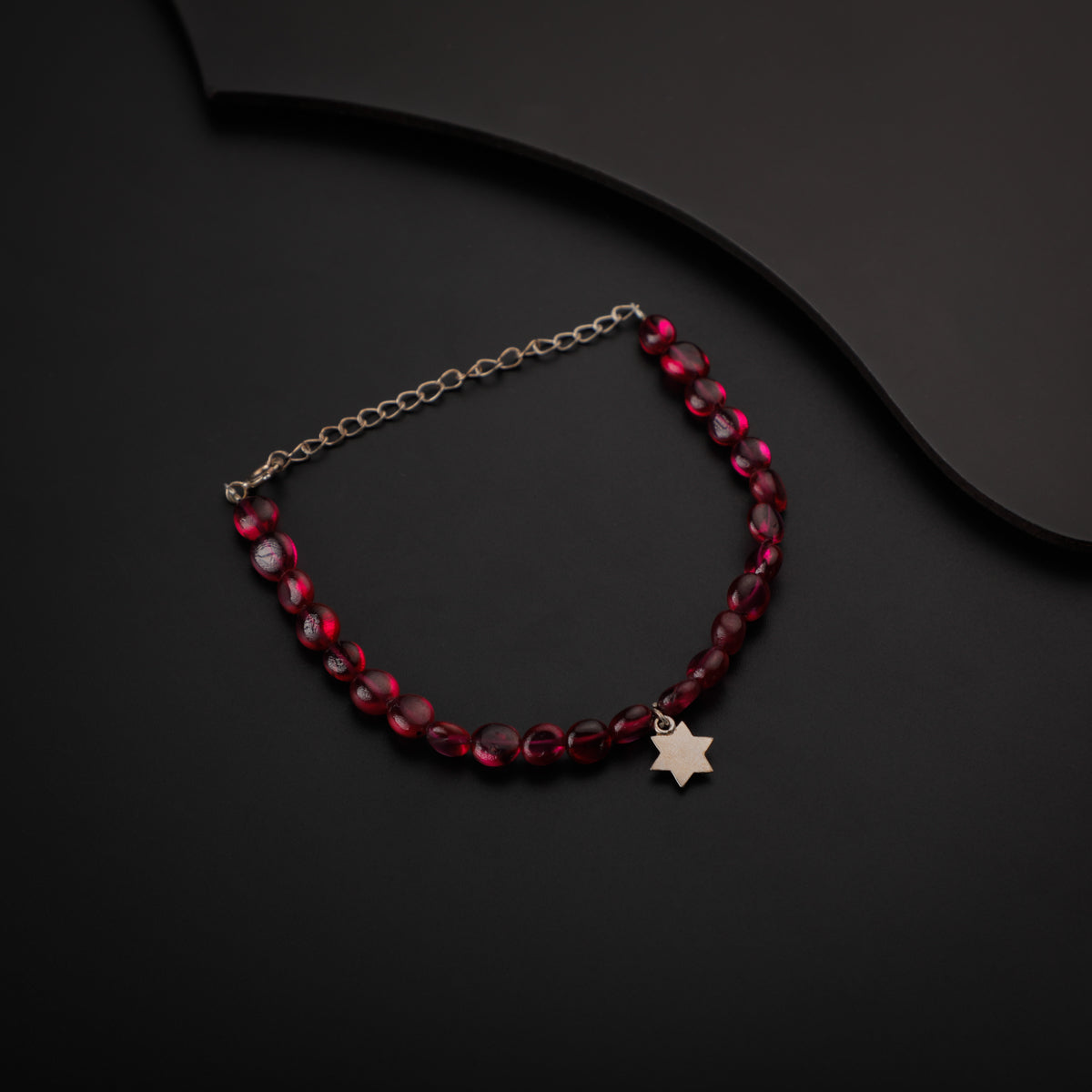 Silver Star Motif Bracelet with Ruby Stones