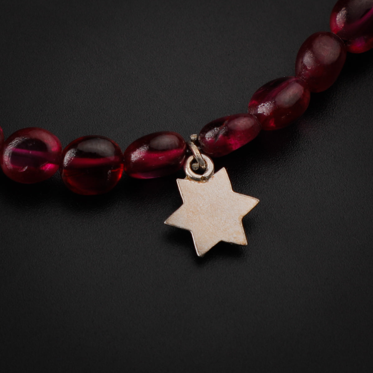 Silver Star Motif Bracelet with Ruby Stones