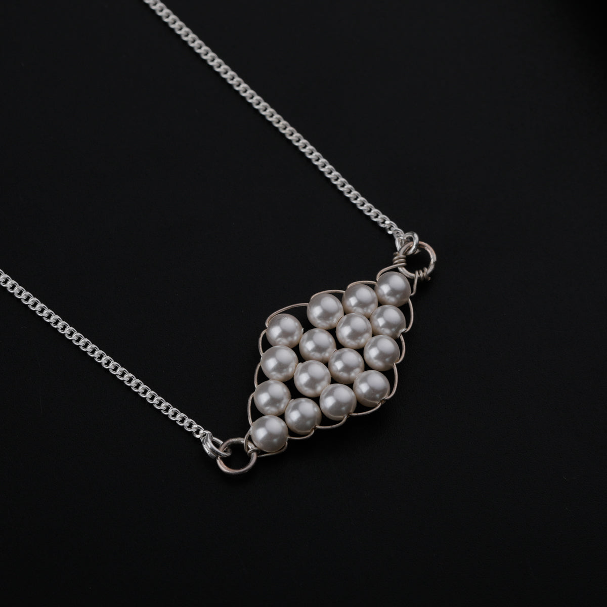 Silver Necklace with Binded Pearl Motif