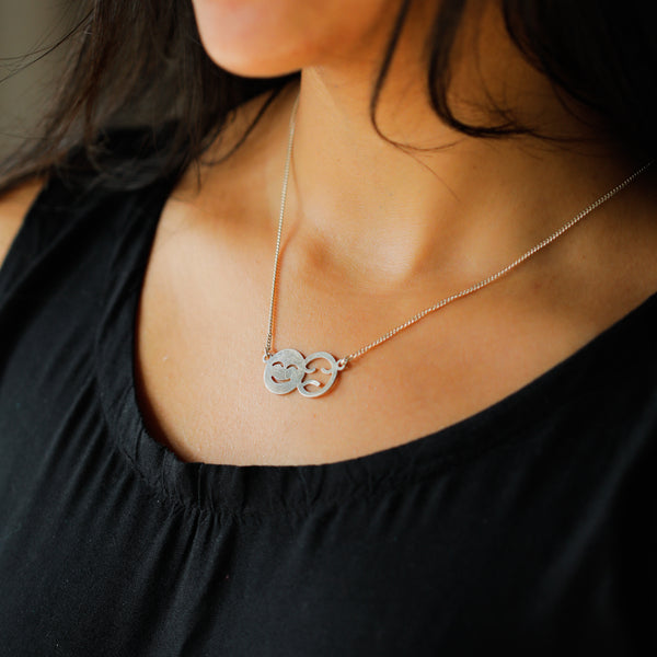 Mood Harmony Pendant necklace with smiley and sad face charms