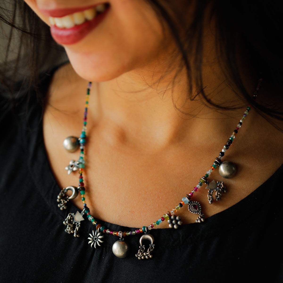 Silver Charms Motifs Necklace with Multicolor Semi Precious Stones