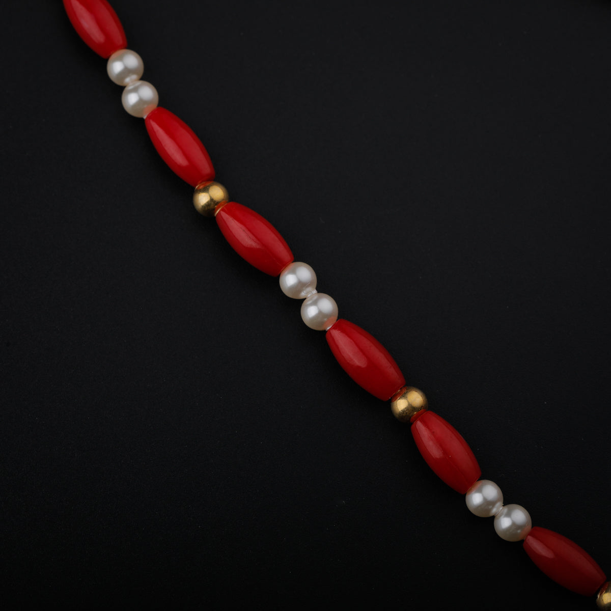 Gold Plated Silver Pearl and Coral Necklace with  ताळी (Taali) Motif