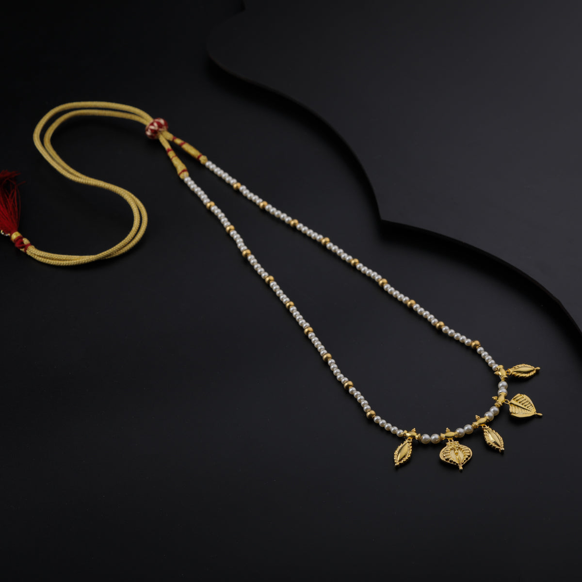 Gold Plated Silver Pearl Necklace with Leaf and बदाम (Badam) Motif