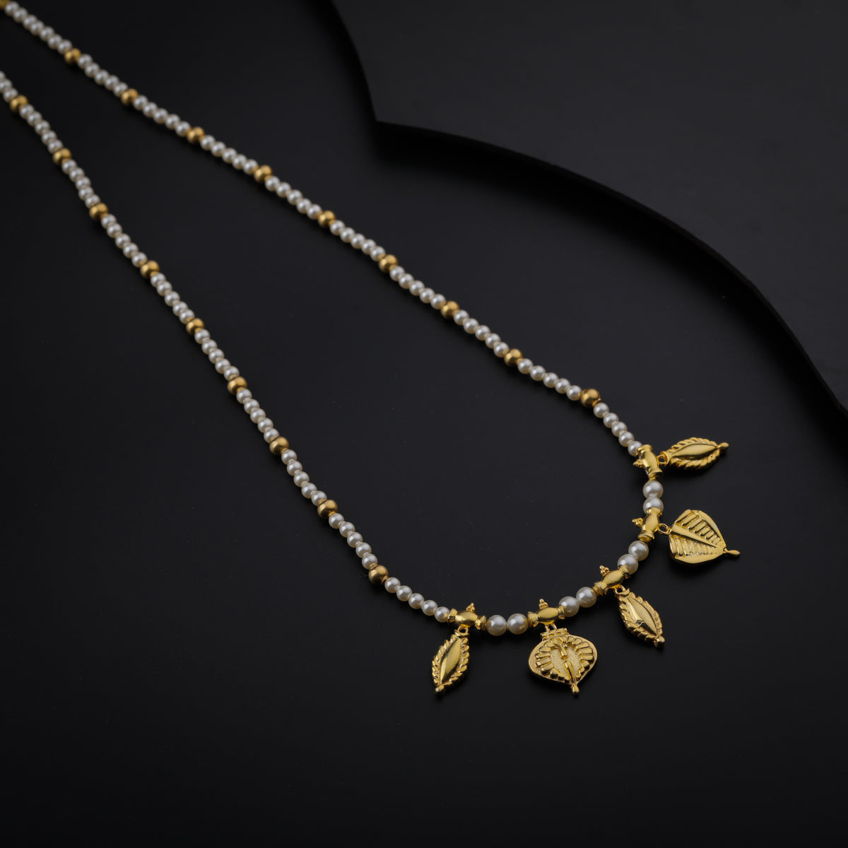 Gold Plated Silver Pearl Necklace with Leaf and बदाम (Badam) Motif