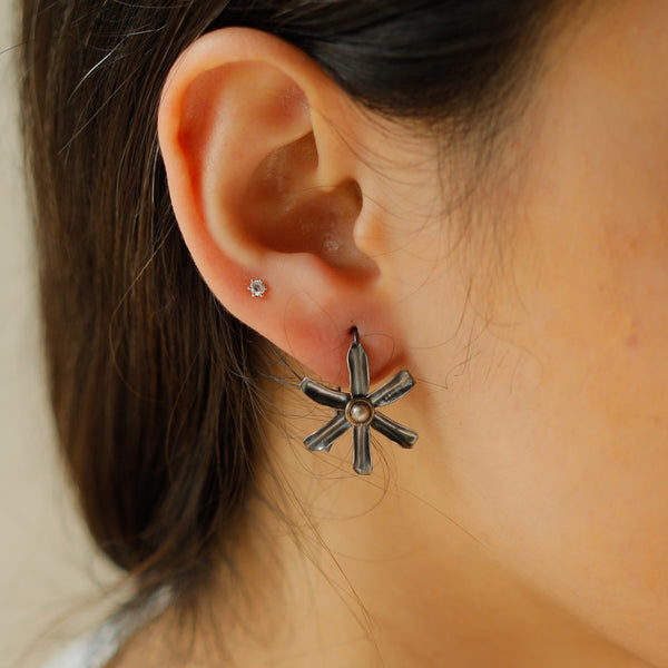 Gulbahaar floral silver earrings close-up handcrafted detailing