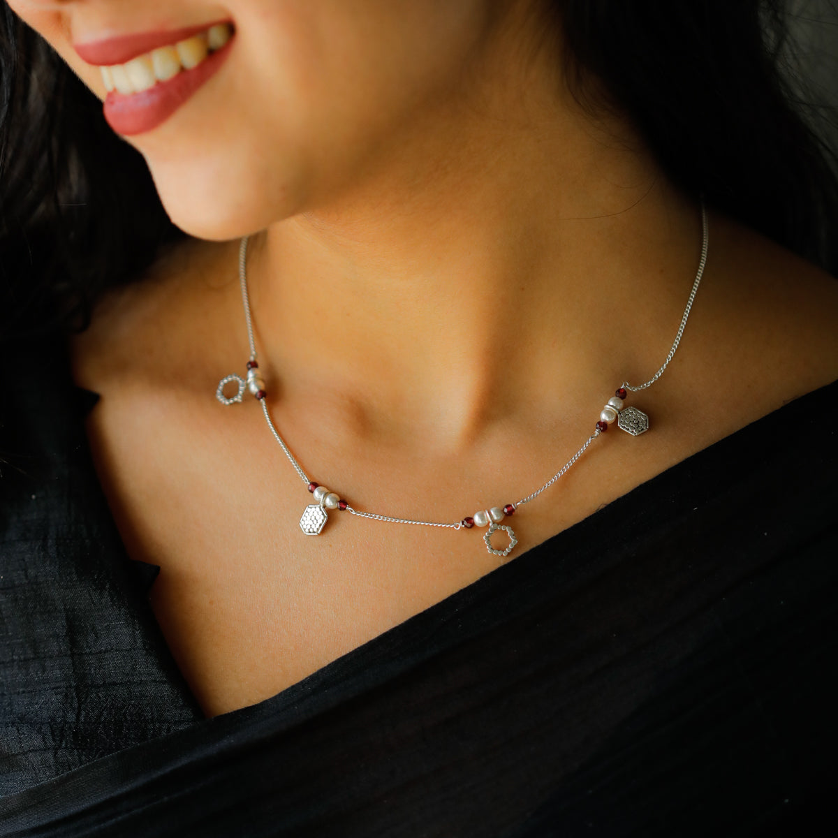 Silver Necklace with Charms and Garnets