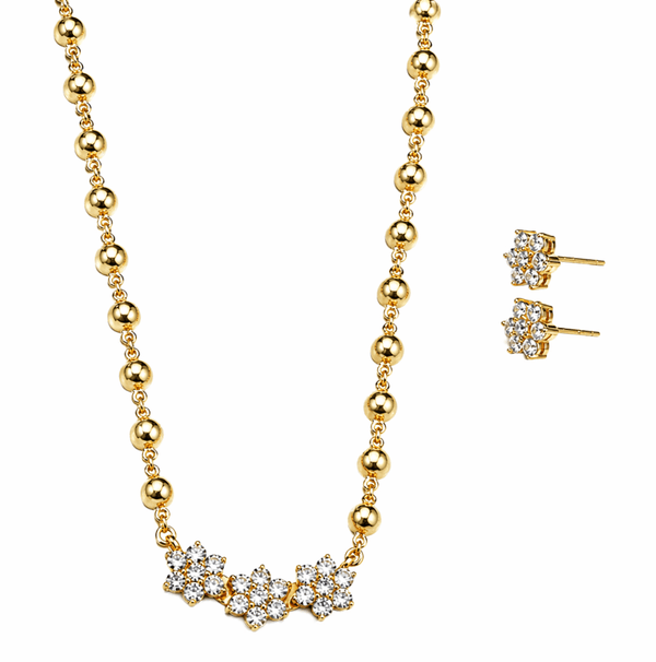 Gold-plated stone-studded flower motif jewelry set with silver beads