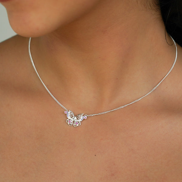 Silver butterfly charm necklace with pink and purple stones