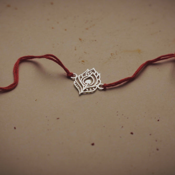 Silver Laser Cut Peacock Feather Rakhi