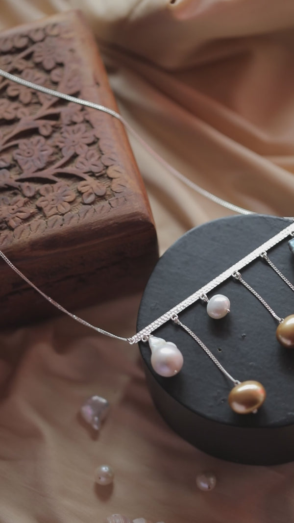 Handcrafted abstract silver necklace with pearls polished finish
