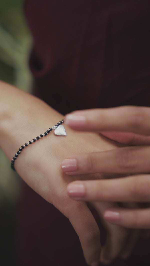 Silver Charm Mangalsutra bracelet with heart pendant