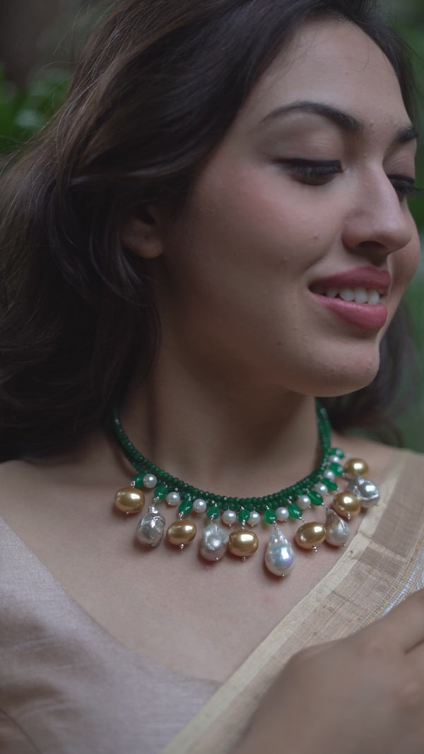 Elegant green onyx and pearl necklace with gold and silver accents
