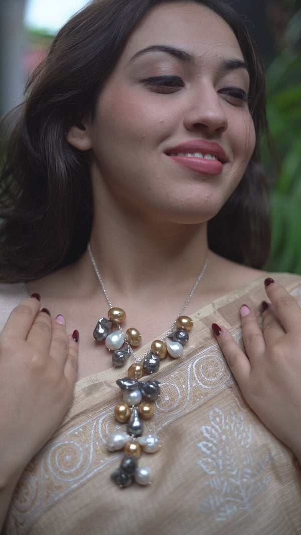Model wearing Luxe Necklace with Baroque Pearls and Silver Chain
