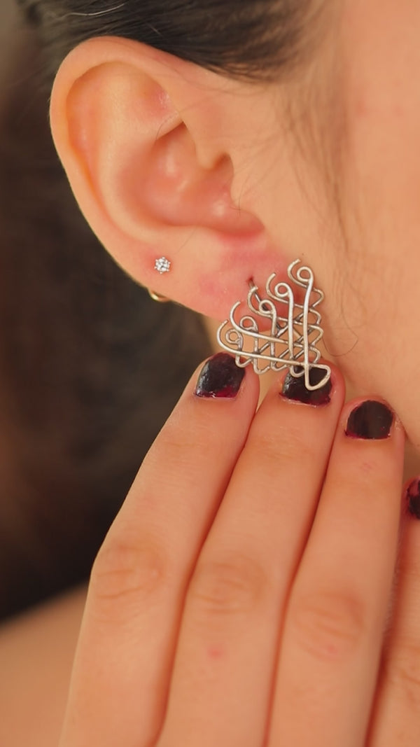 Handcrafted silver Saraswati earrings polished finish