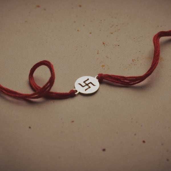 Silver Laser Cut Swastik Rakhi (mini)