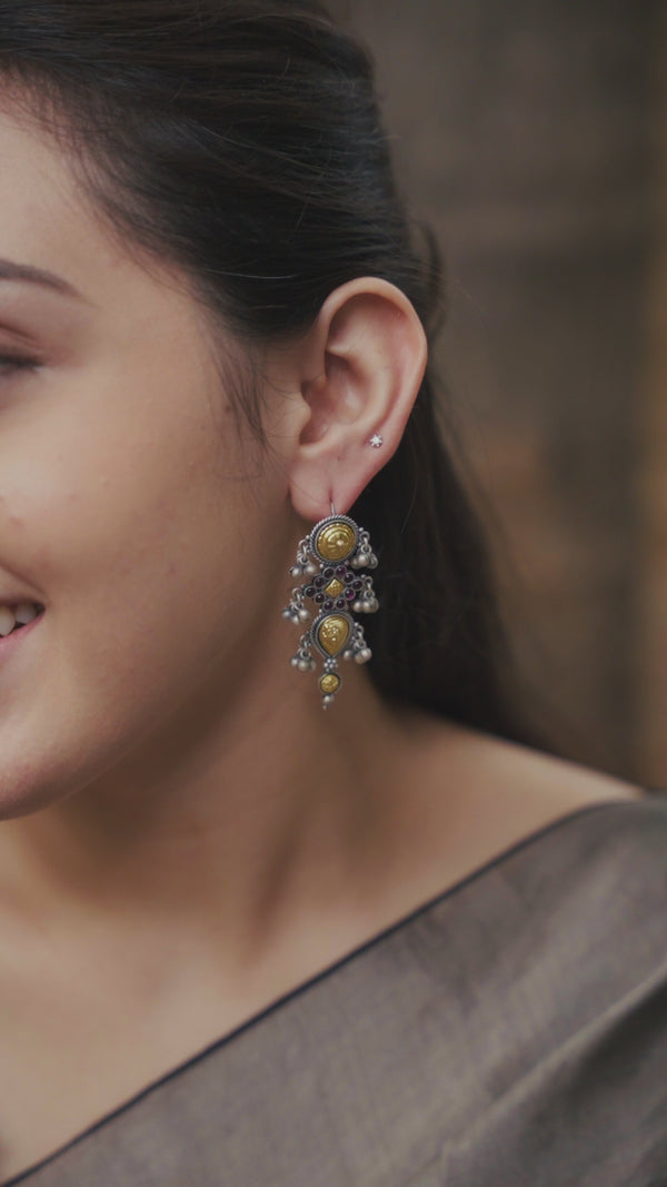 Silver Rajasthani Pupat earrings with intricate design and pearl accents