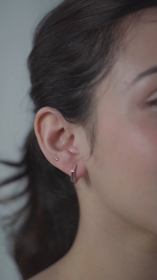 Silver hexagon hoop earrings with CZ stones