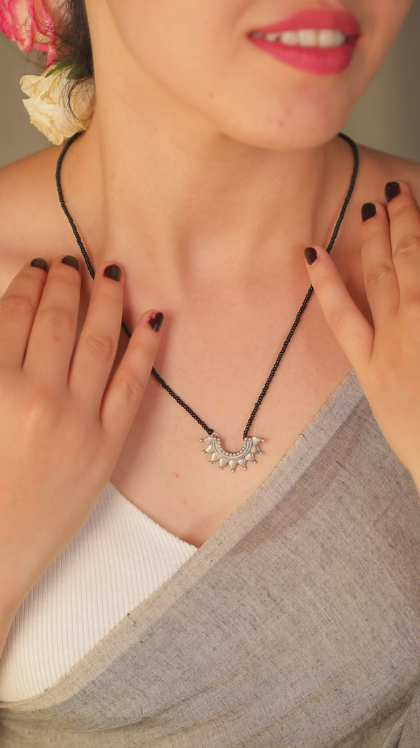 Ghumat Mangalsutra necklace with silver pendant on black chain