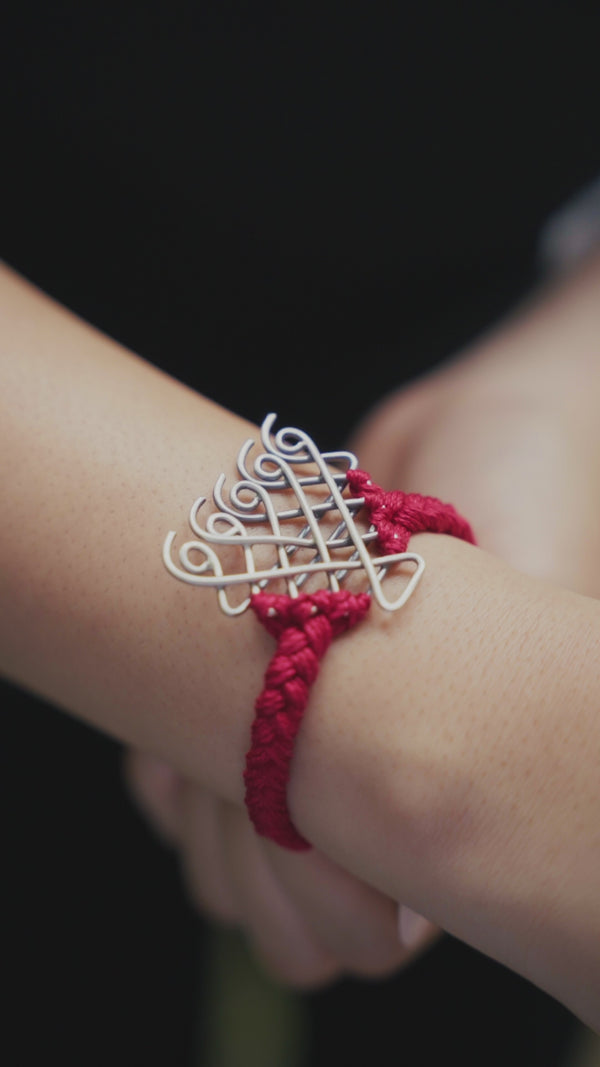 Red thread Saraswati silver bracelet design