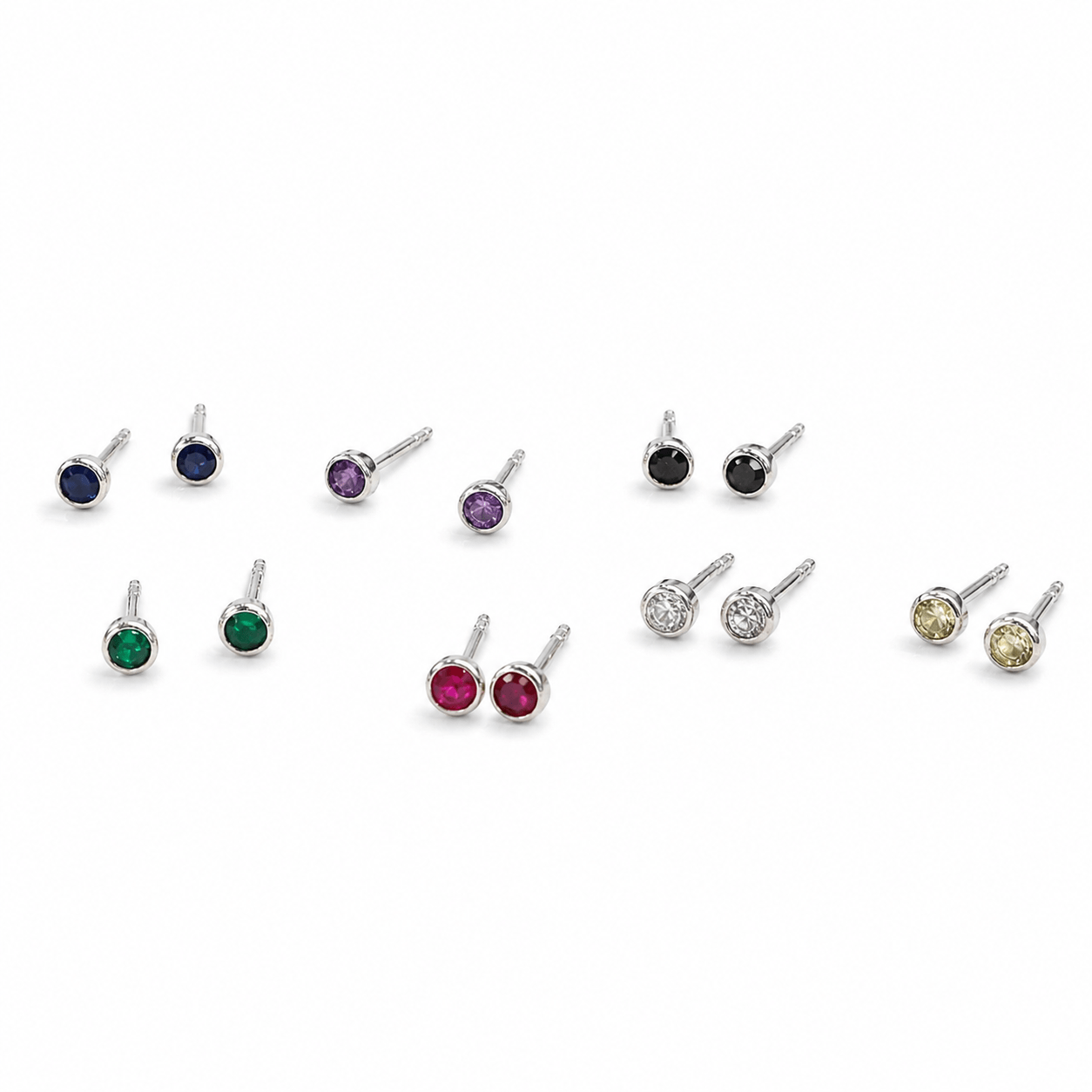 Colorful gemstone stud earrings in silver setting