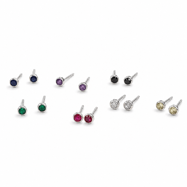 Colorful gemstone stud earrings in silver setting