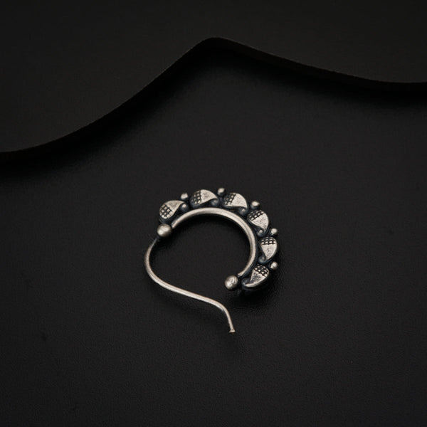 a black background with a pair of ear buds