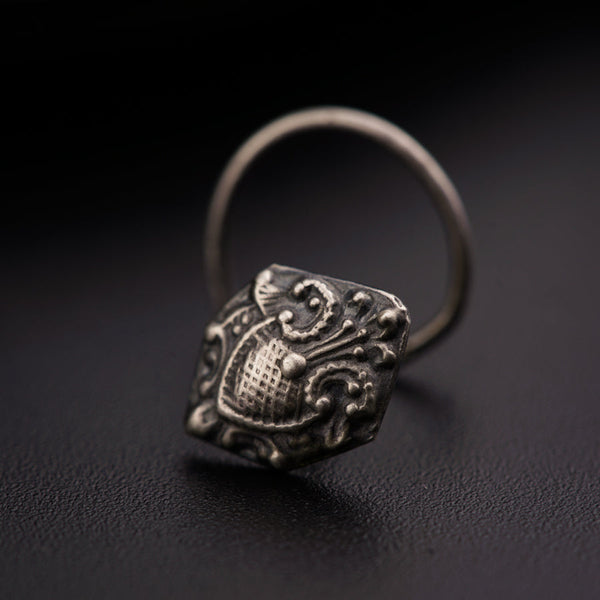 a close up of a ring on a table