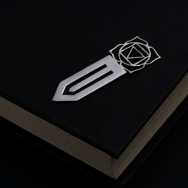 a book with a knife on top of it