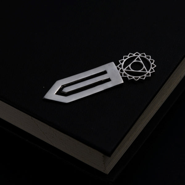 a book with a knife on top of it