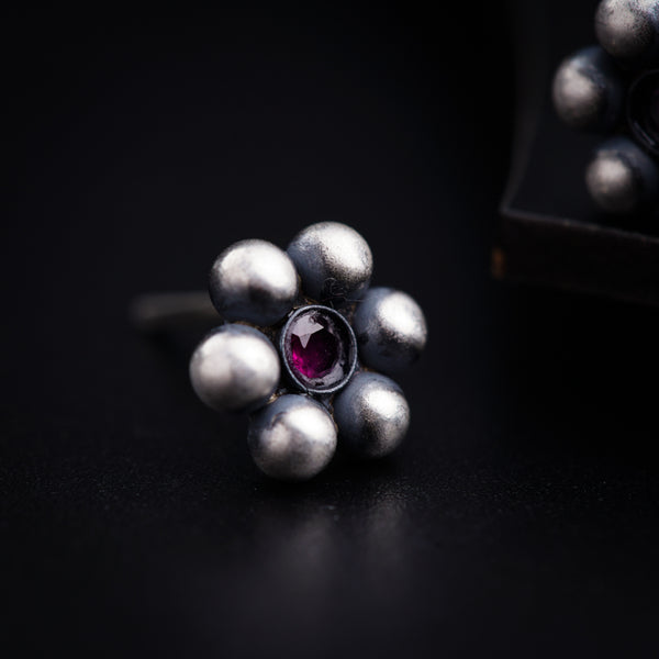 a close up of a ring on a table