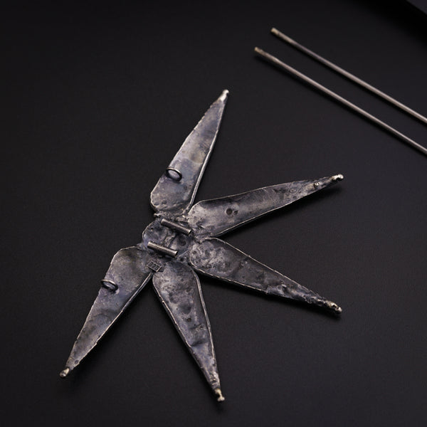 a pair of scissors sitting on top of a table