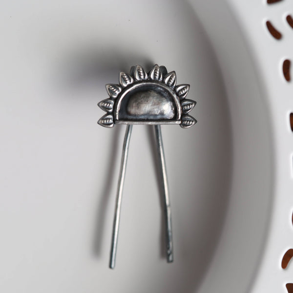 a spoon and spoon rest on a white plate