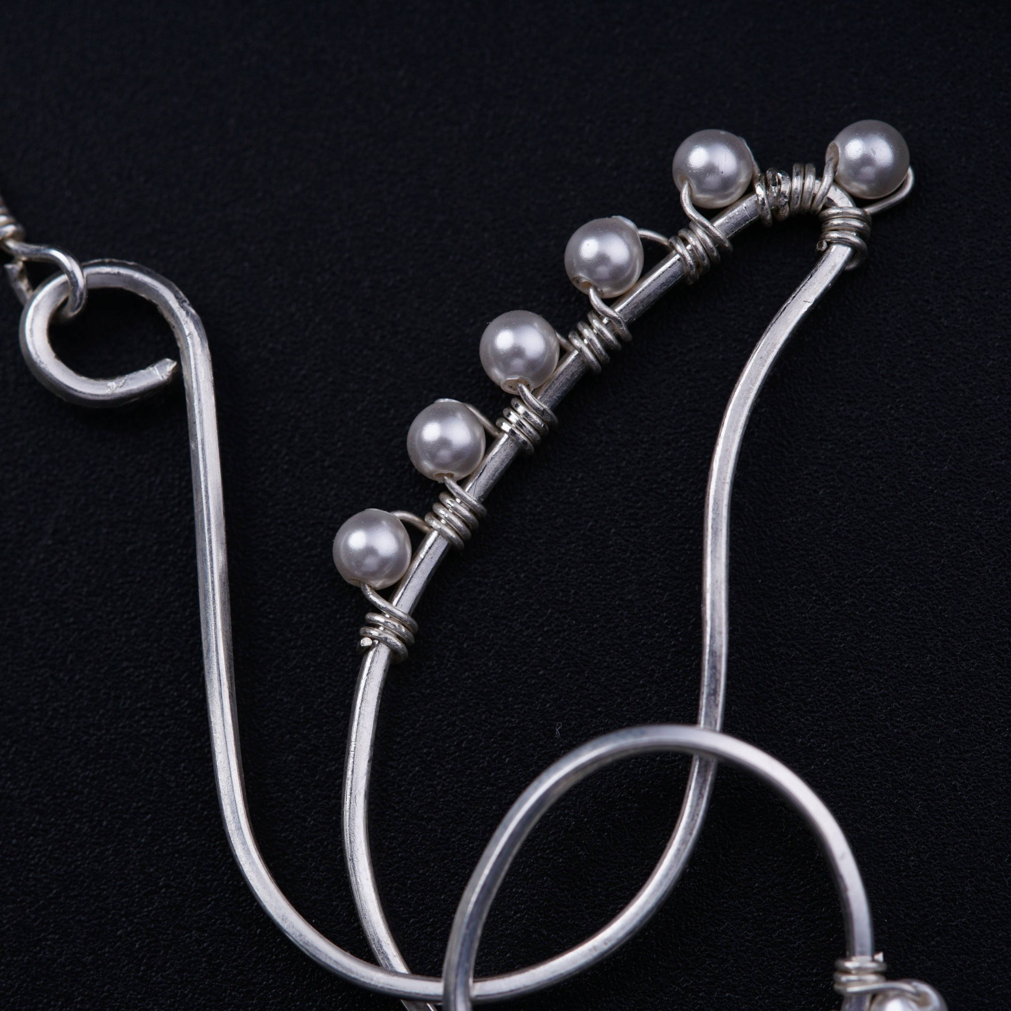 Abstract Silver Earrings: Hook Style